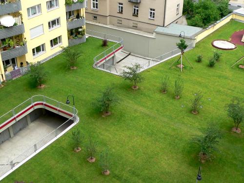 Green roof with lawn on top of an underground garage